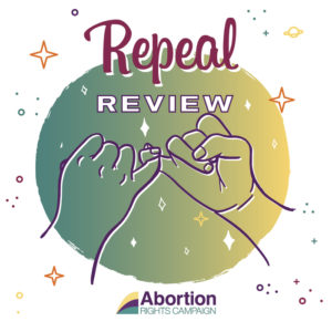 Two hands holding little fingers in a pinky swear on a green and yellow circle. background is white with stars. text reads: Repeal Review. 
